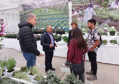 Eyal Inbar and Haim Rosenblum of Hishtil talking with visitors. 